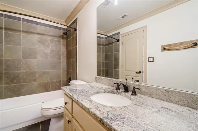 a bathroom with a sink and shower