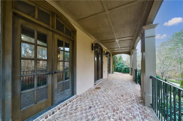 a kitchen with stainless steel appliances granite countertop a stove and a microwave