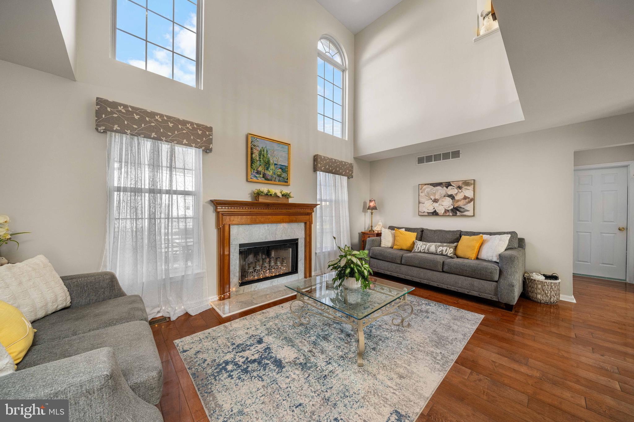 18 Savoy Road Newark, DE 19702 - Photo 5 of 44 a living room with furniture and a fireplace