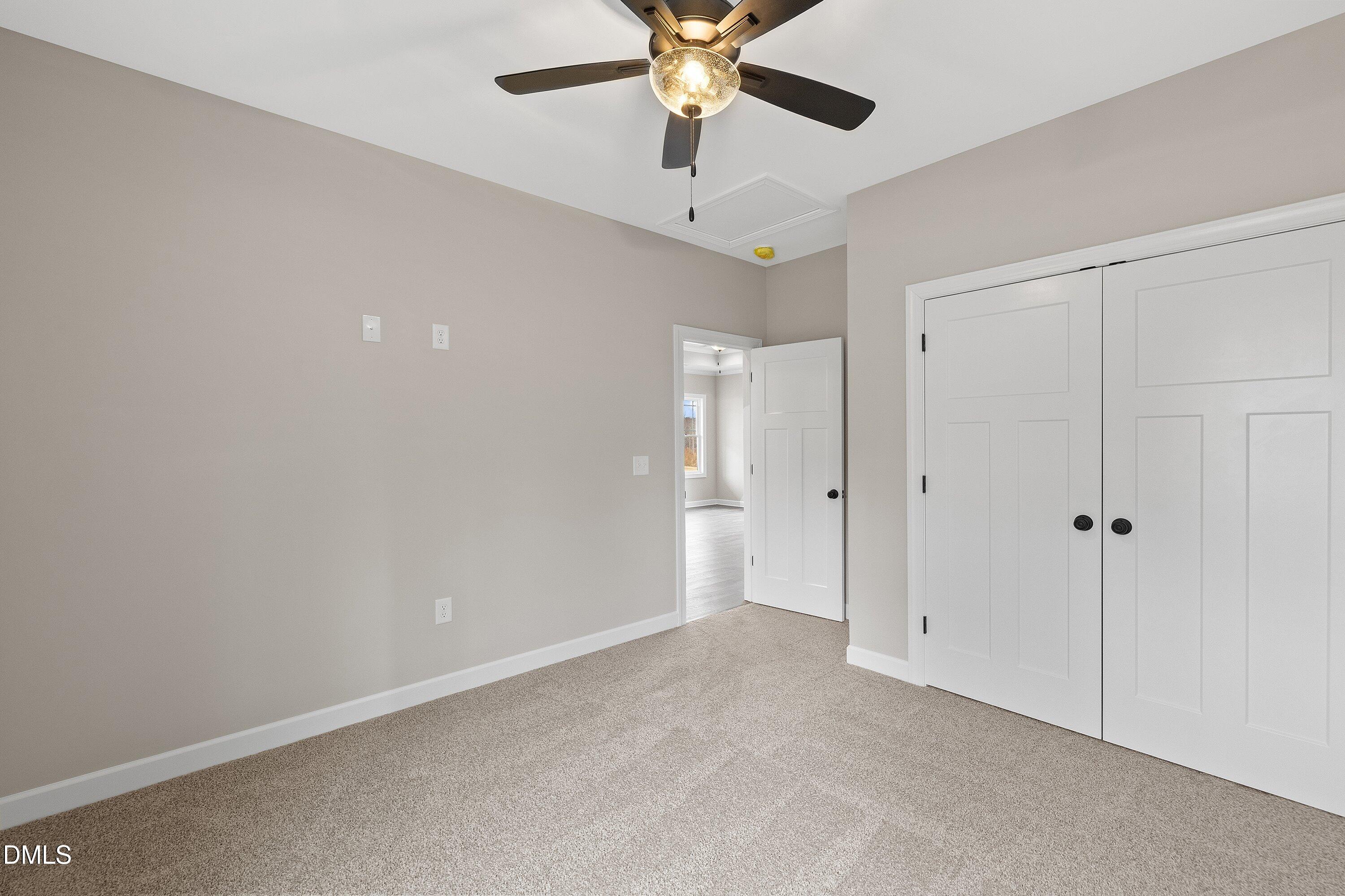 920 Micro Road West Selma, NC 27576 - Photo 22 of 34 a view of an empty room and chandelier fan