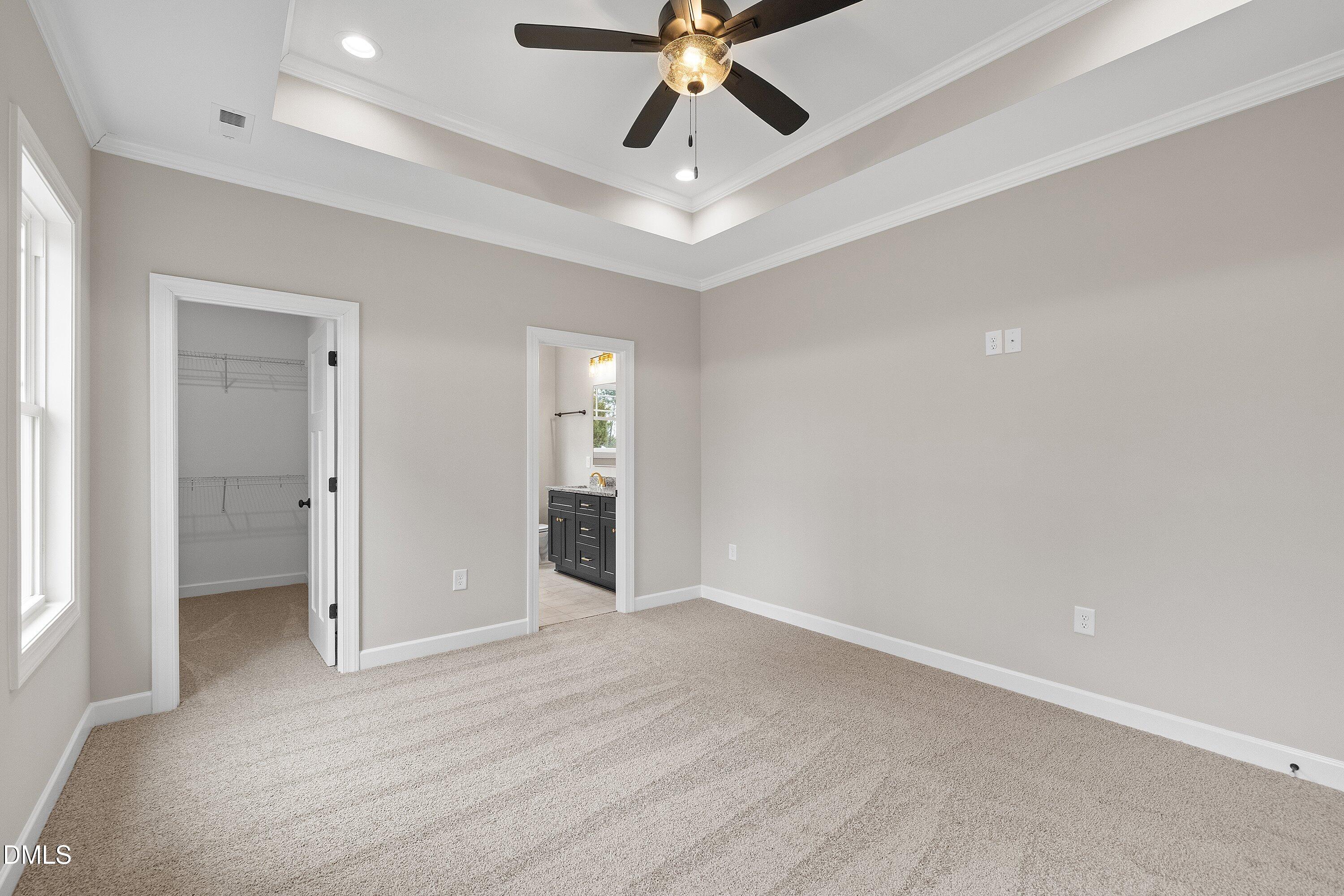 920 Micro Road West Selma, NC 27576 - Photo 28 of 32 an empty room with fan and a ceiling fan