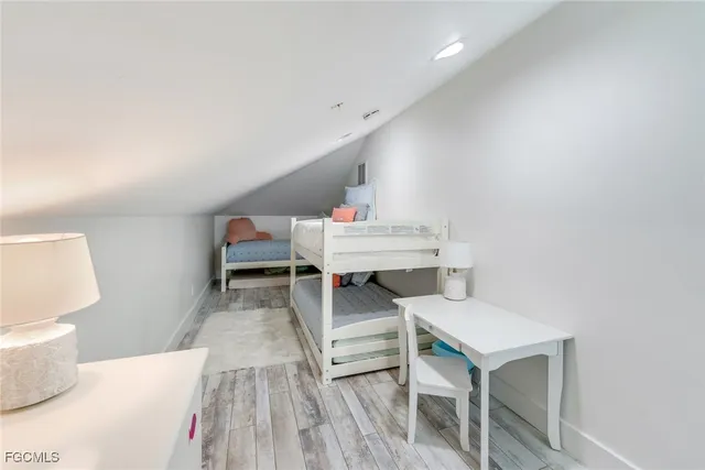 a picture of a living room with a rug