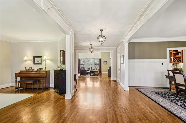 a view of a dining room with furniture and window