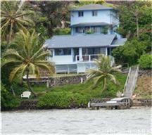 45-032 Lilipuna Road Kaneohe, HI 96744 - Photo 1 of 1 a front view of a house with a garden