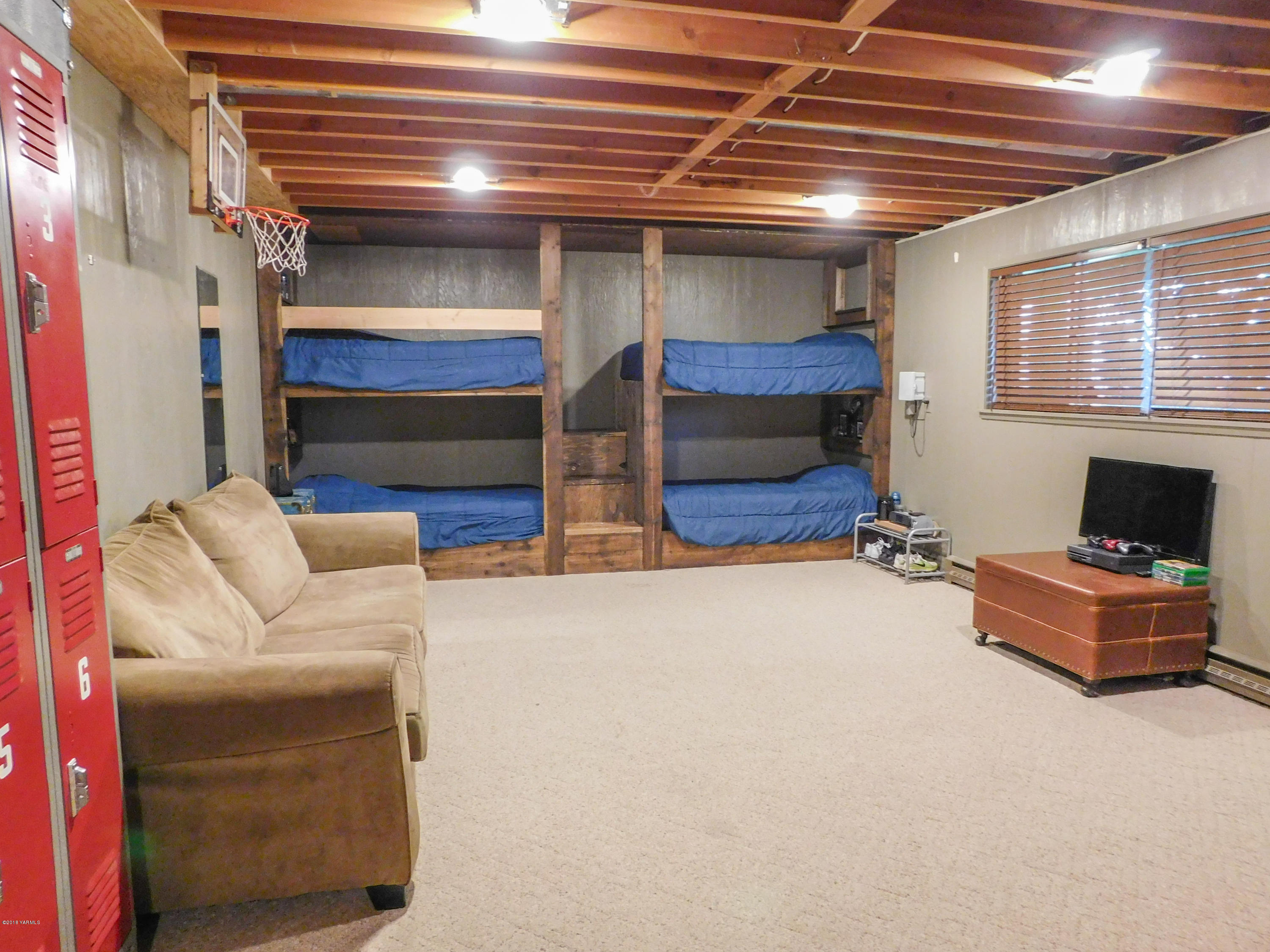 6904 Mieras Road Yakima, WA 98901 - Photo 14 of 19 a living room with furniture and a fireplace