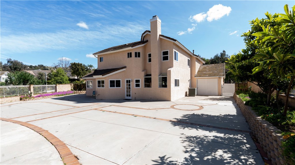 2409 Coraview Lane Rowland Heights, CA 91748 - Photo 13 of 23 a front view of a house with a yard