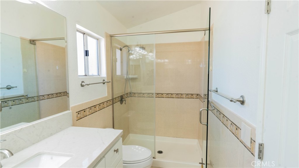 2409 Coraview Lane Rowland Heights, CA 91748 - Photo 7 of 23 a bathroom with a shower a sink and a toilet