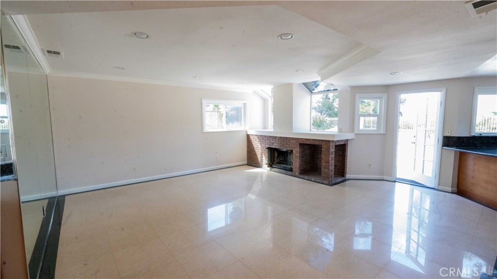 2409 Coraview Lane Rowland Heights, CA 91748 - Photo 8 of 23 a view of a big room with windows and chandelier