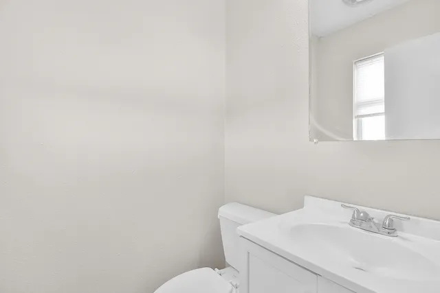 a bathroom with a sink and a toilet