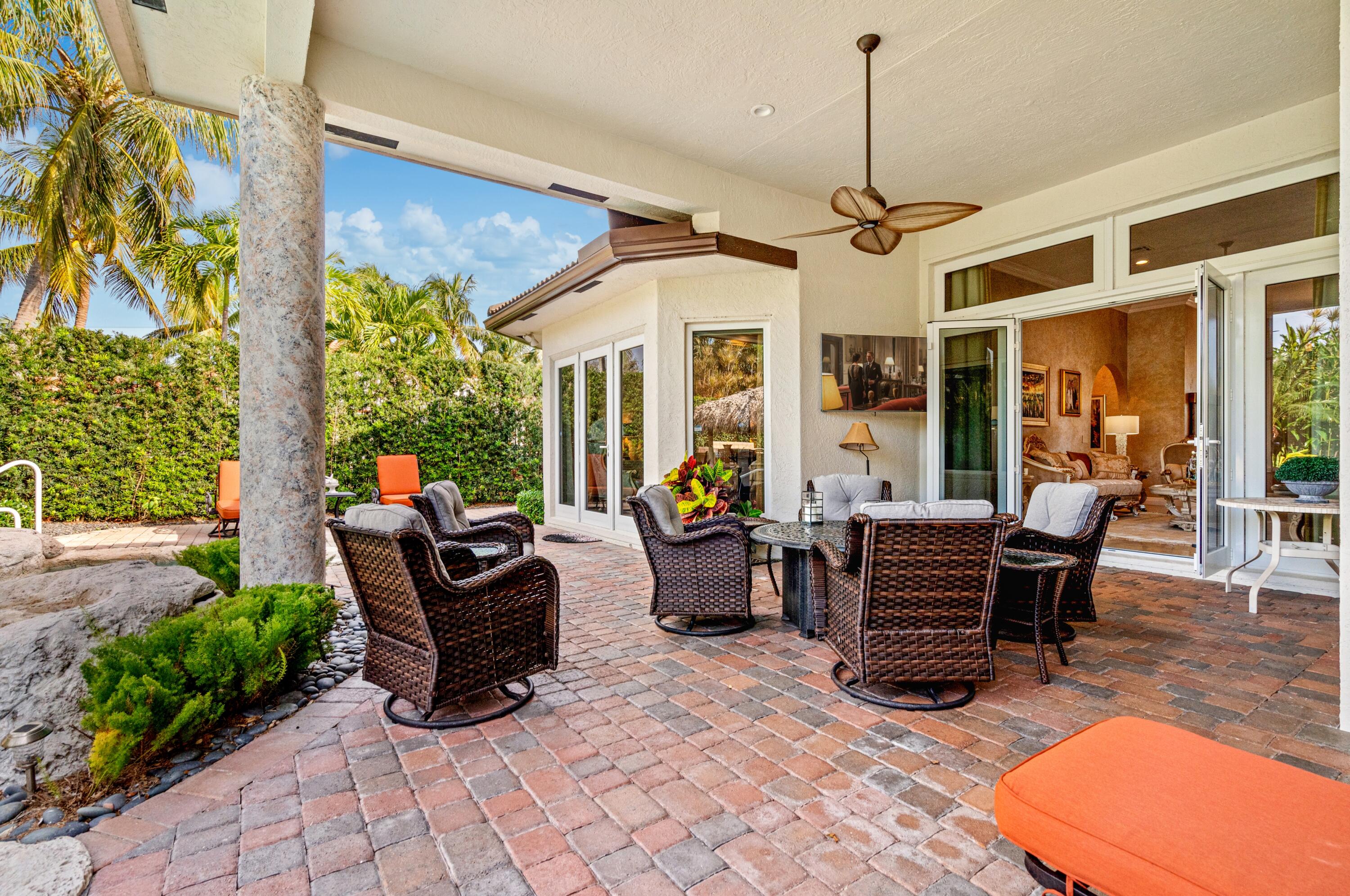 2161 Acorn Palm Road Boca Raton, FL 33432 - Photo 39 of 54 mls_PATIO_SEATING_LEFT_ANGLE