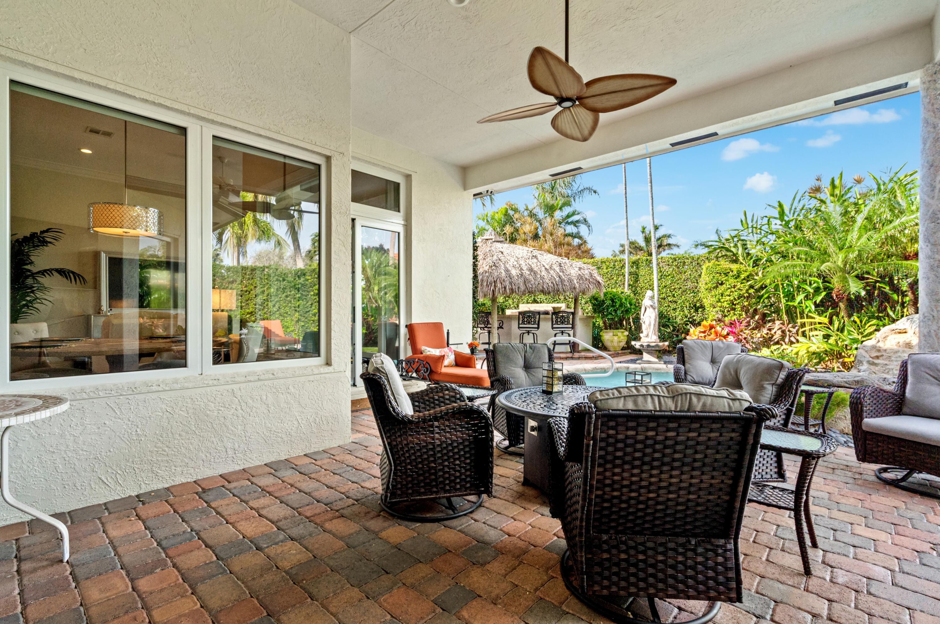 2161 Acorn Palm Road Boca Raton, FL 33432 - Photo 40 of 54 mls_PATIO_SEATING_RIGHT