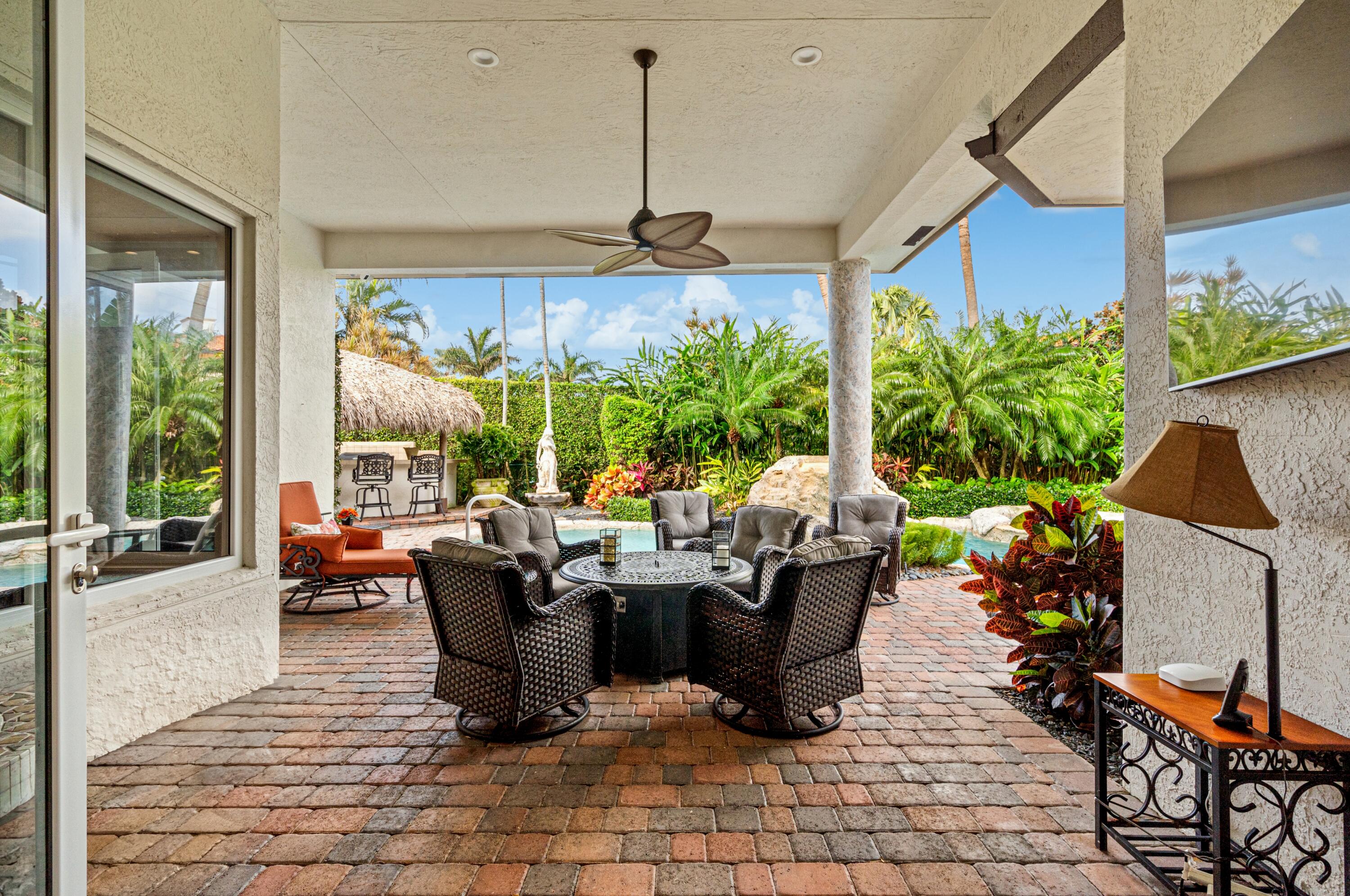 2161 Acorn Palm Road Boca Raton, FL 33432 - Photo 42 of 54 mls_PATIO_SEATING_STRAIGHT