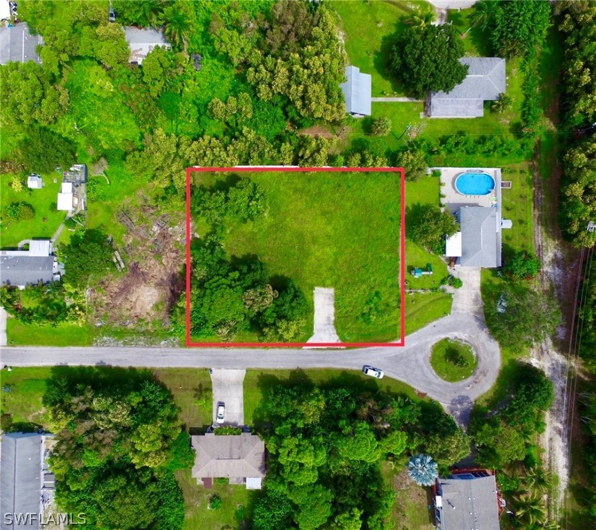 5478 Judith Road Bokeelia, FL 33922 - Photo 11 of 11 an aerial view of a house with yard swimming pool and outdoor seating