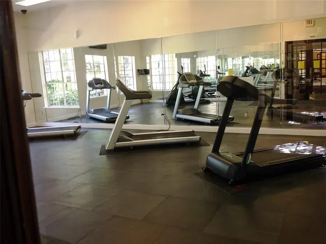 a pool table with window and tub