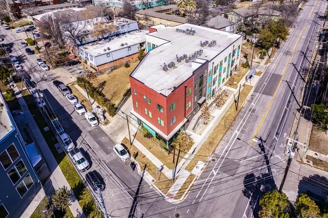 a view of a building with glass door