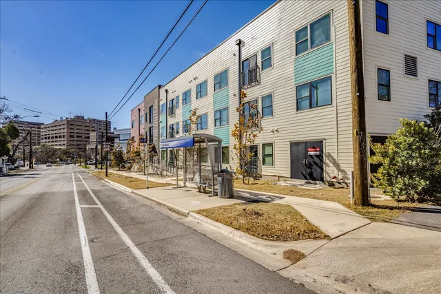 a view of a building with a street