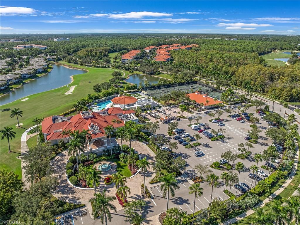 4923 Cerromar Drive Naples, FL 34112 - Photo 29 of 39 a view of a lake with a city