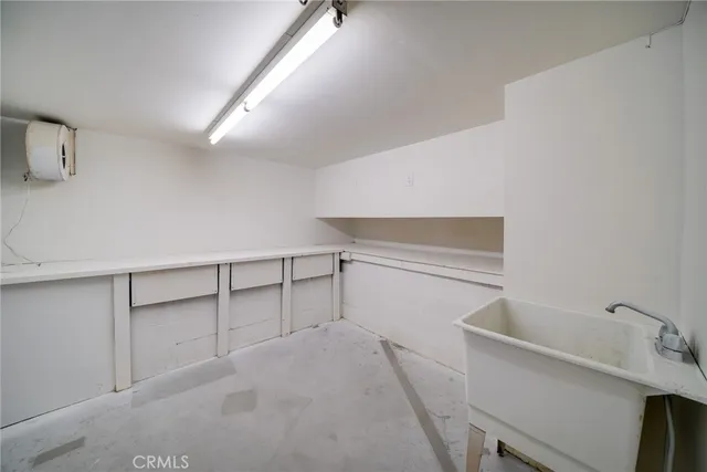 a view of a room with racks on the wall