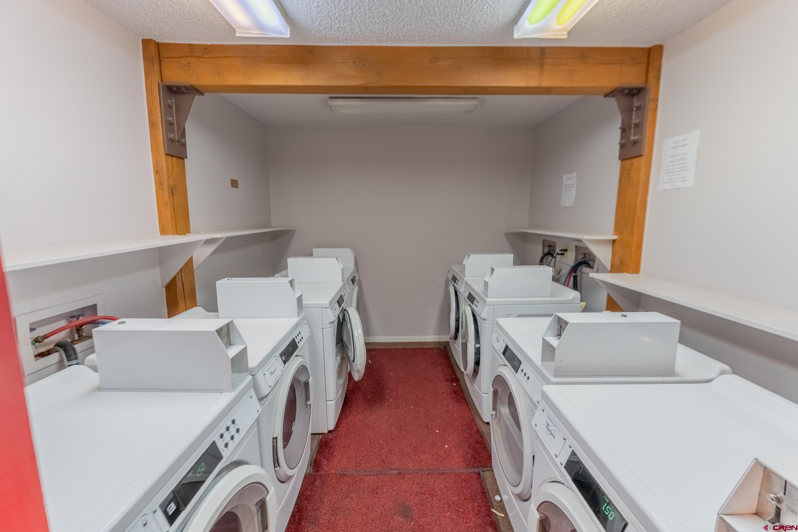25 Emmons Road, Unit 37 Crested Butte, CO 81225 - Photo 26 of 35 a utility room with dryer and washer