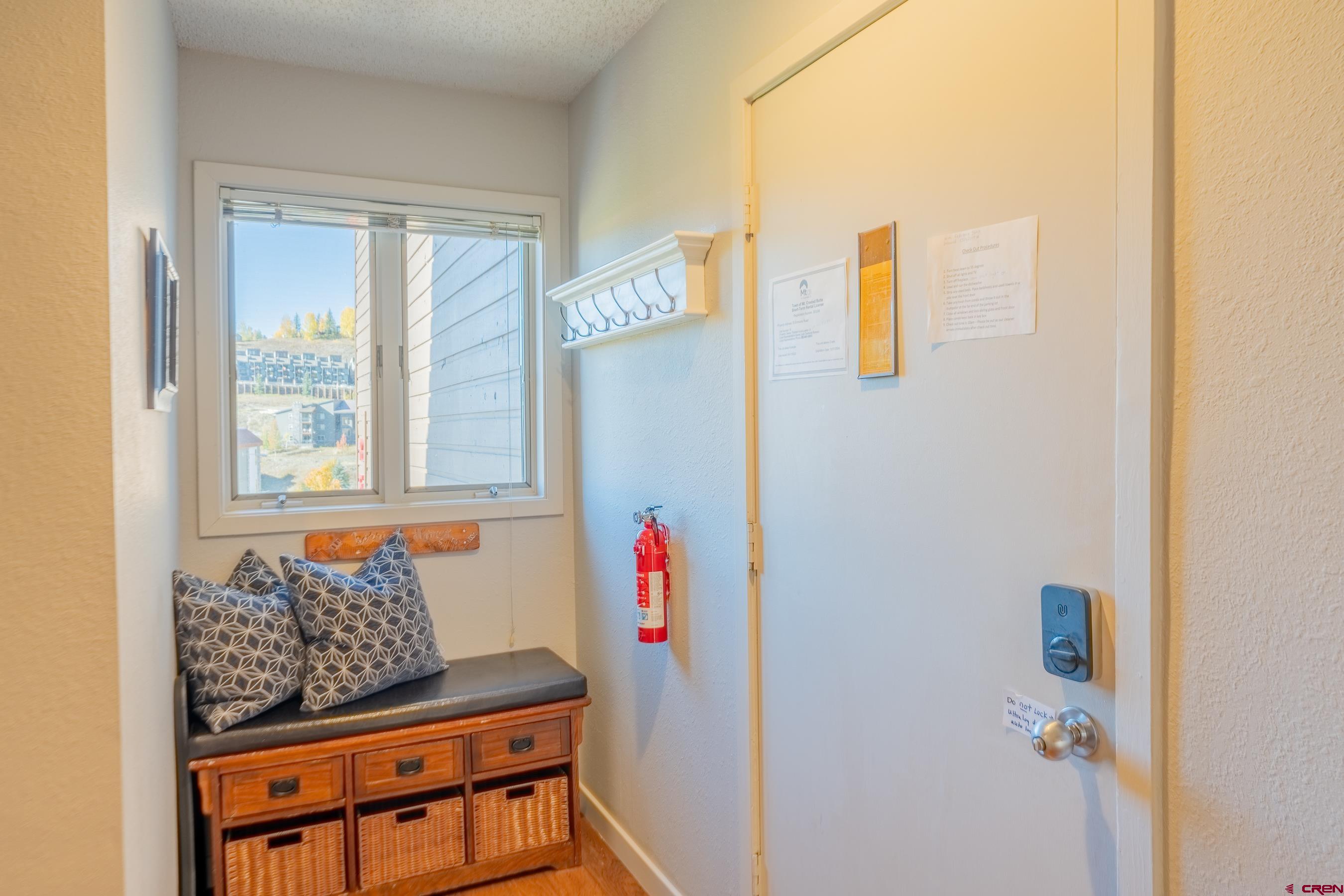25 Emmons Road, Unit 37 Crested Butte, CO 81225 - Photo 3 of 35 a living room with furniture and a window