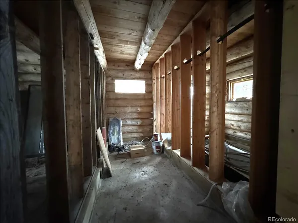 a view of empty room with windows