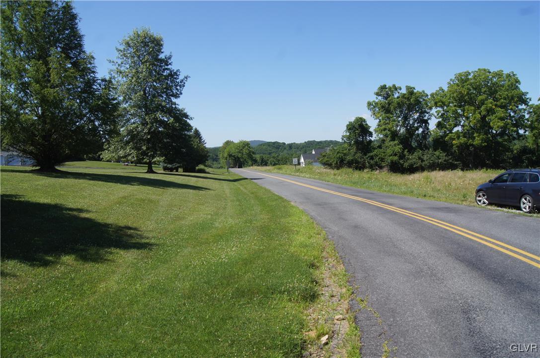 860 Texas Road Easton, PA 18042 - Photo 8 of 10 a view of a golf course with a lake view