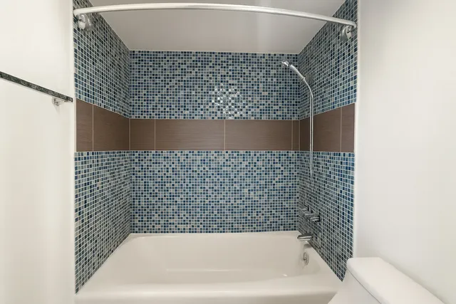 a bathroom with a bathtub