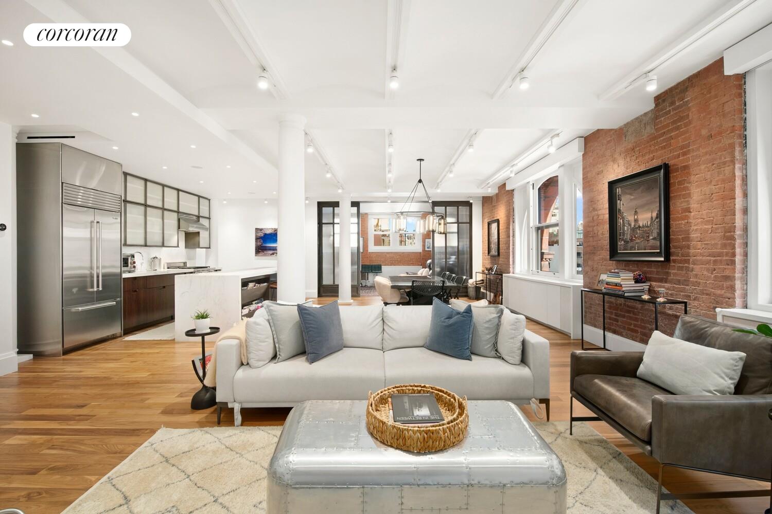 55 Hudson Street, Unit 7CD Manhattan, NY 10013 - Photo 10 of 25 a living room with furniture and view of kitchen