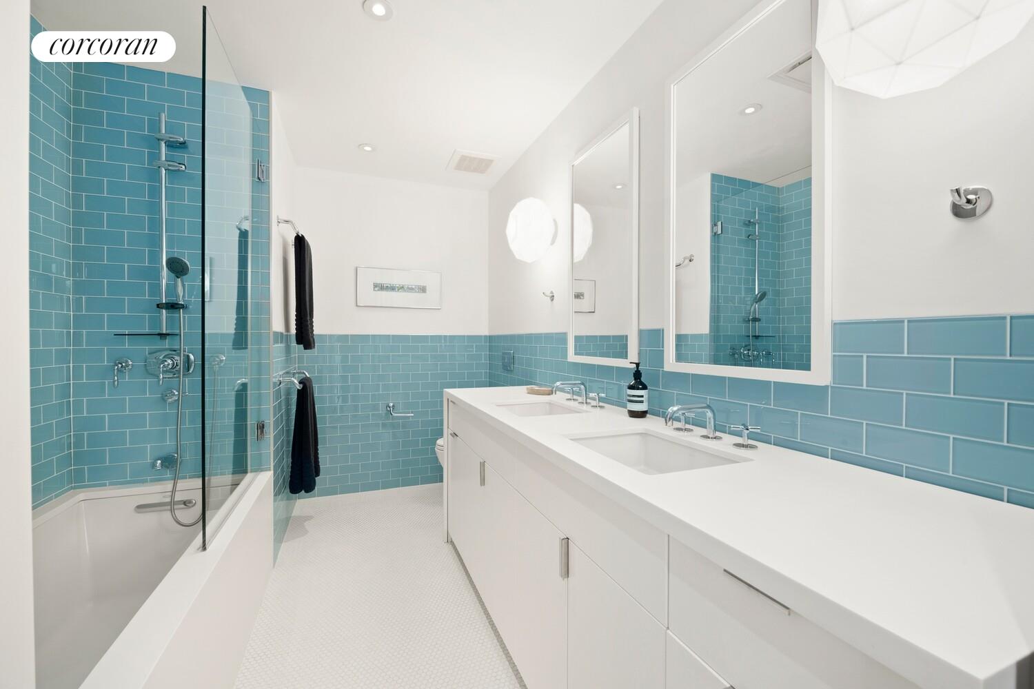 55 Hudson Street, Unit 7CD Manhattan, NY 10013 - Photo 19 of 25 a bathroom with a sink and a mirror