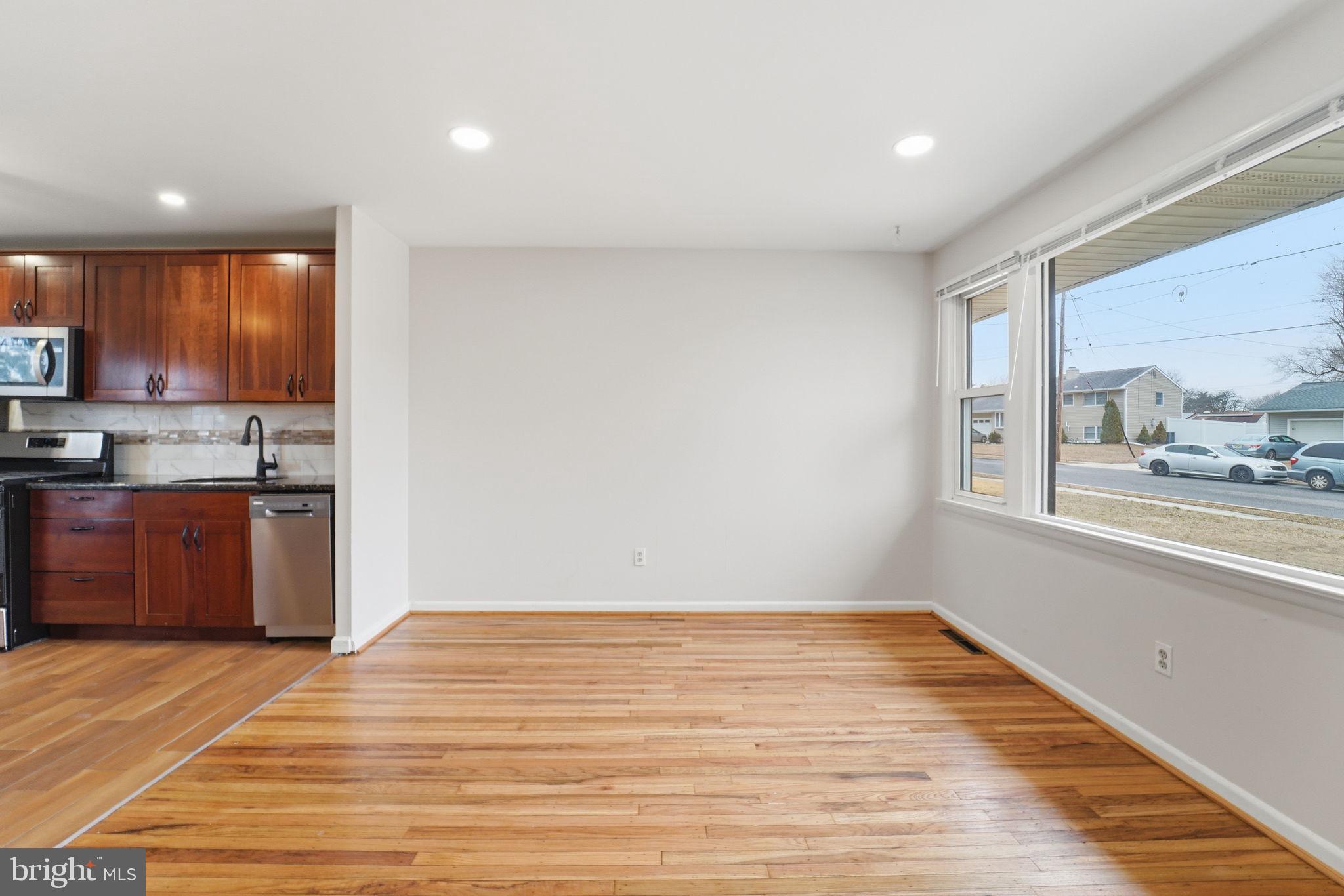 490 Hamilton Road Wenonah, NJ 08090 - Photo 13 of 49 a view of kitchen with wooden floor and electronic appliances