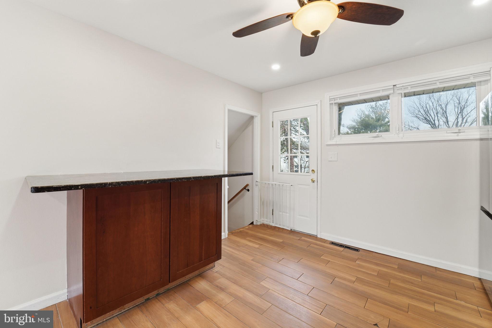 490 Hamilton Road Wenonah, NJ 08090 - Photo 25 of 49 wooden floor in an empty room with a window