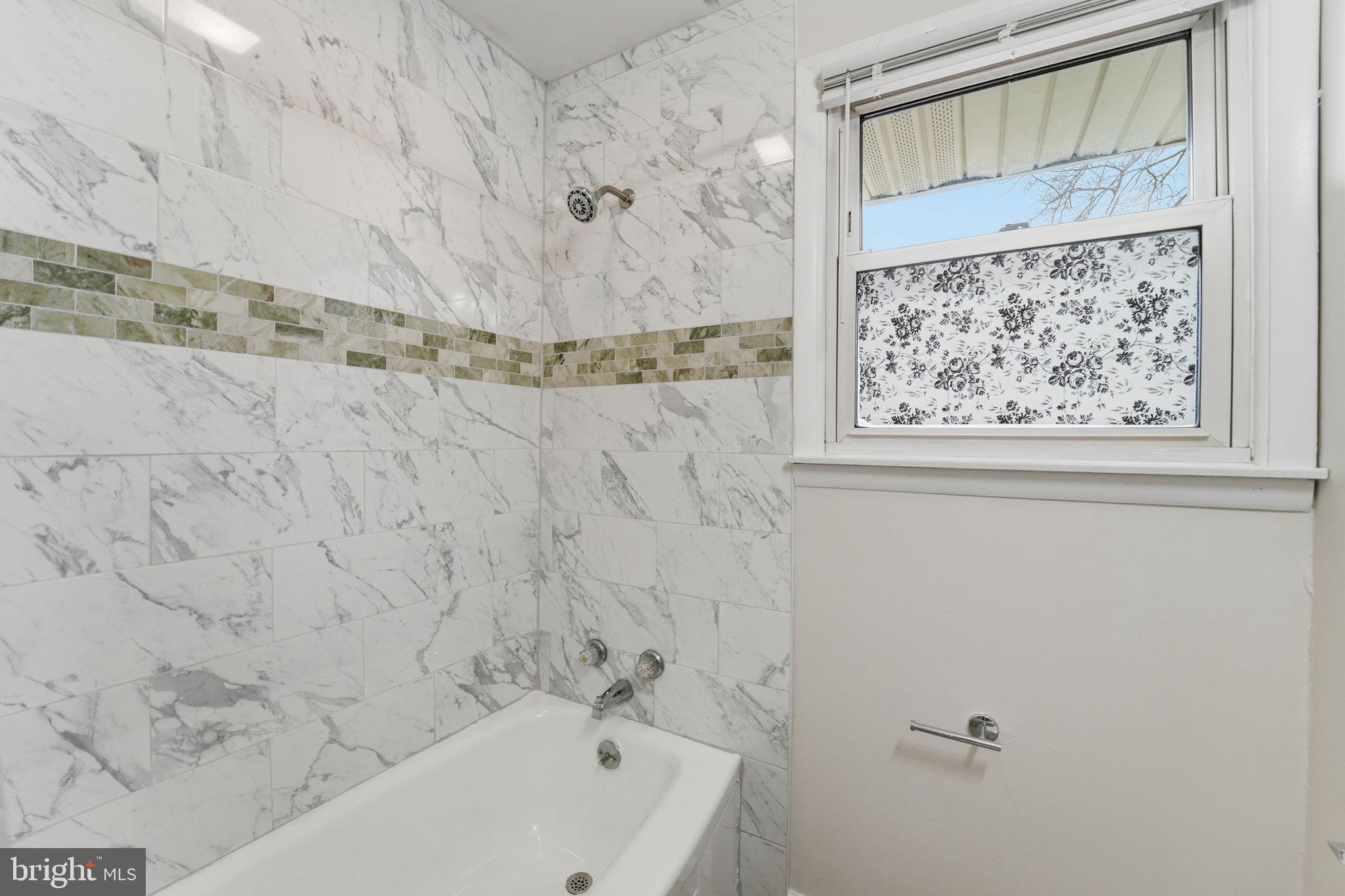 490 Hamilton Road Wenonah, NJ 08090 - Photo 32 of 49 a bathroom with a bathtub and shower