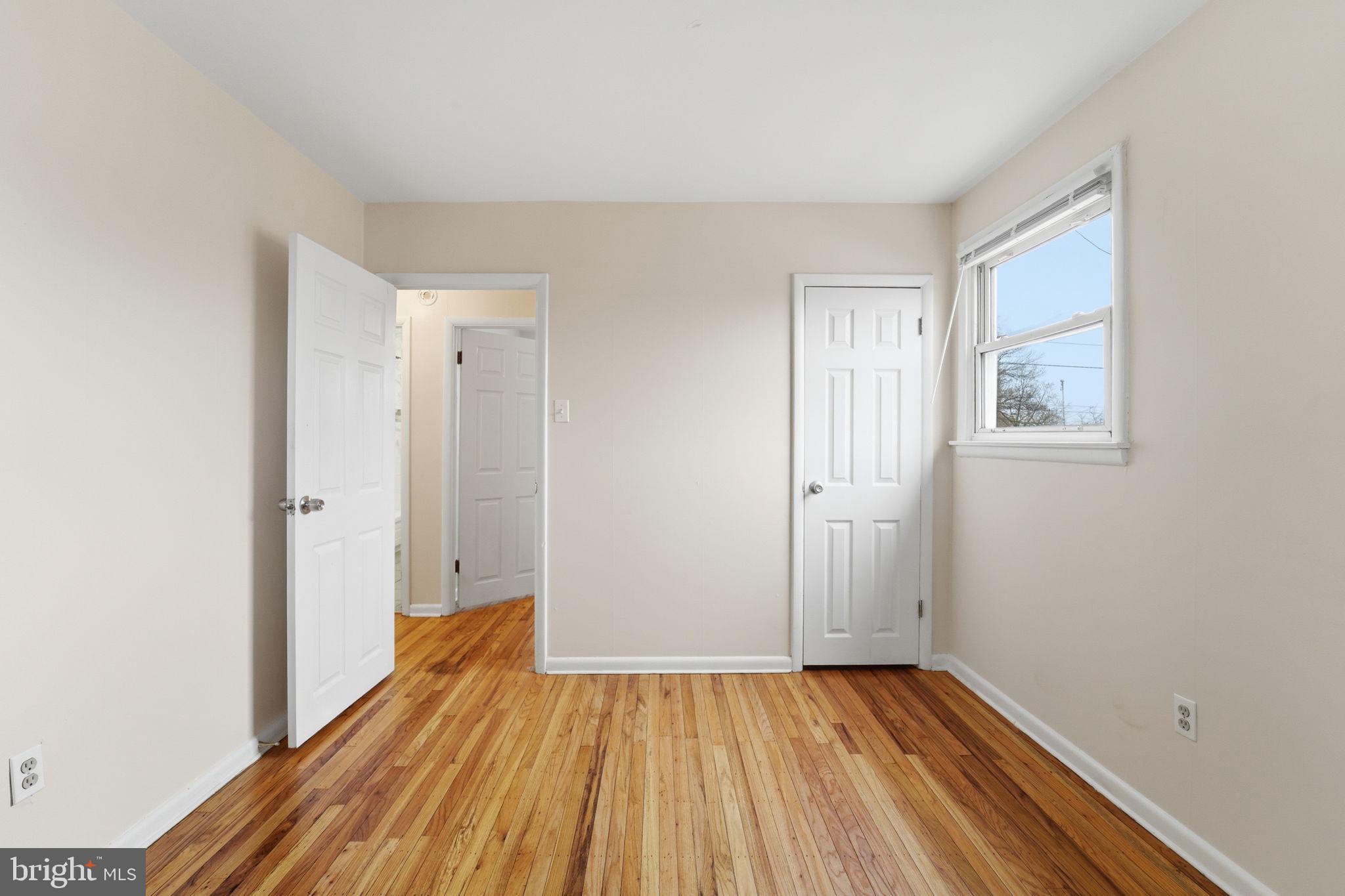 490 Hamilton Road Wenonah, NJ 08090 - Photo 39 of 49 a view of a room with wooden floor and a window
