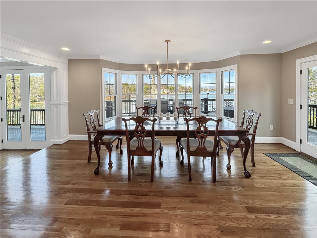 26 Beacon Ridge Circle Salem, SC 29676 - Photo 21 of 46 This spacious dining room features gleaming hardwood floors and expansive windows overlooking the water.