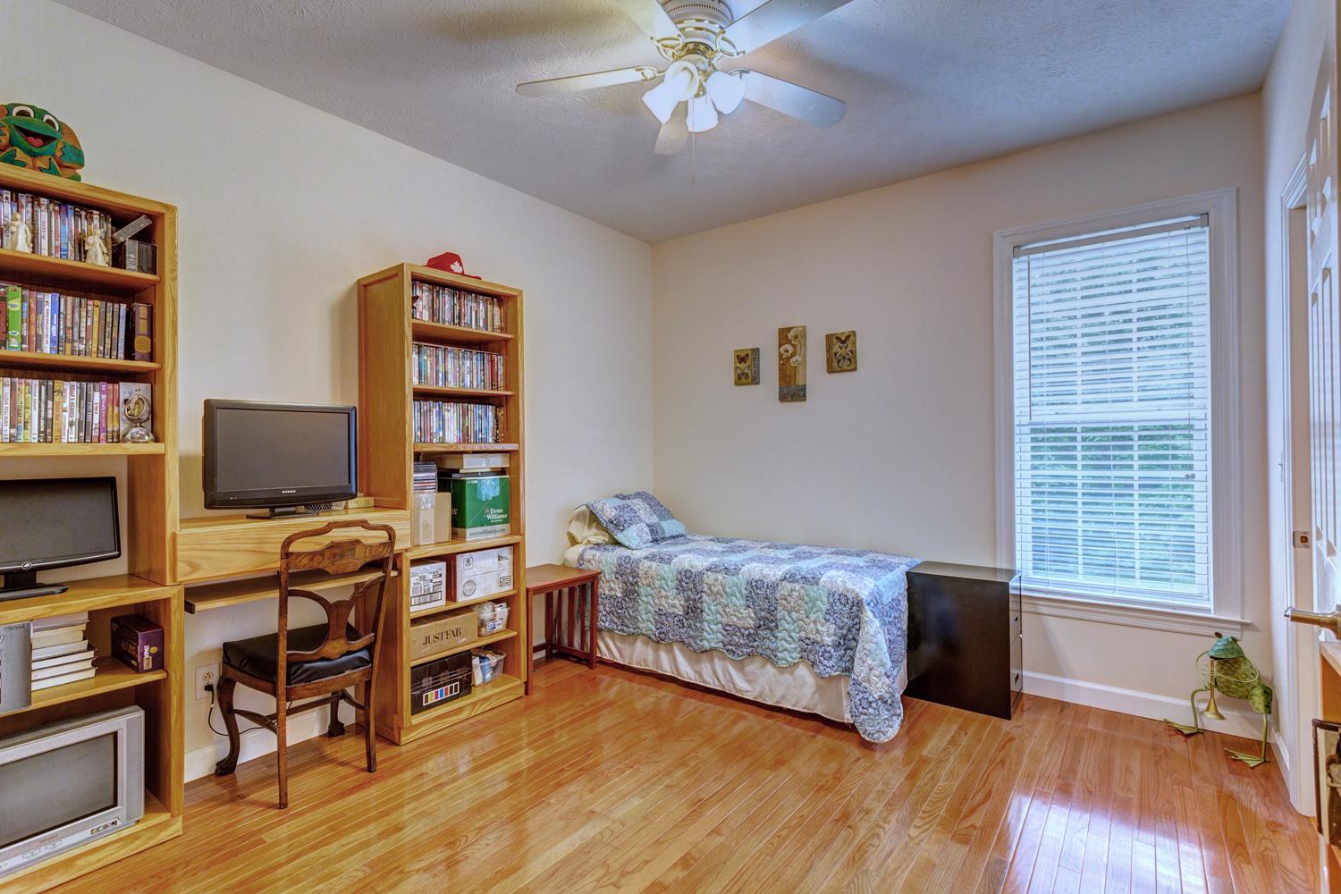 7571 Webster Road White House, TN 37188 - Photo 17 of 30 a living room with furniture and a flat screen tv