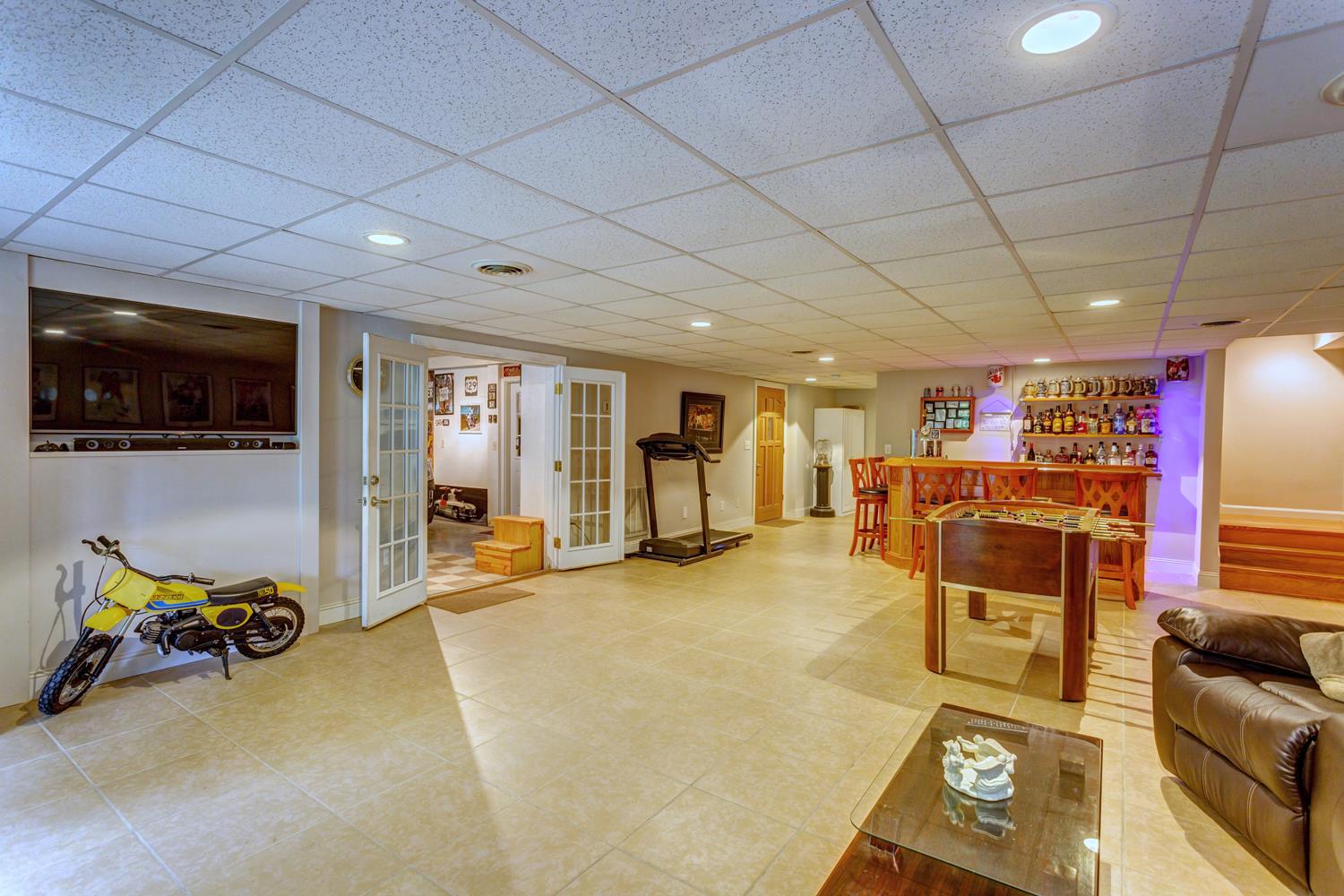 7571 Webster Road White House, TN 37188 - Photo 21 of 30 a room with furniture and a flat screen tv
