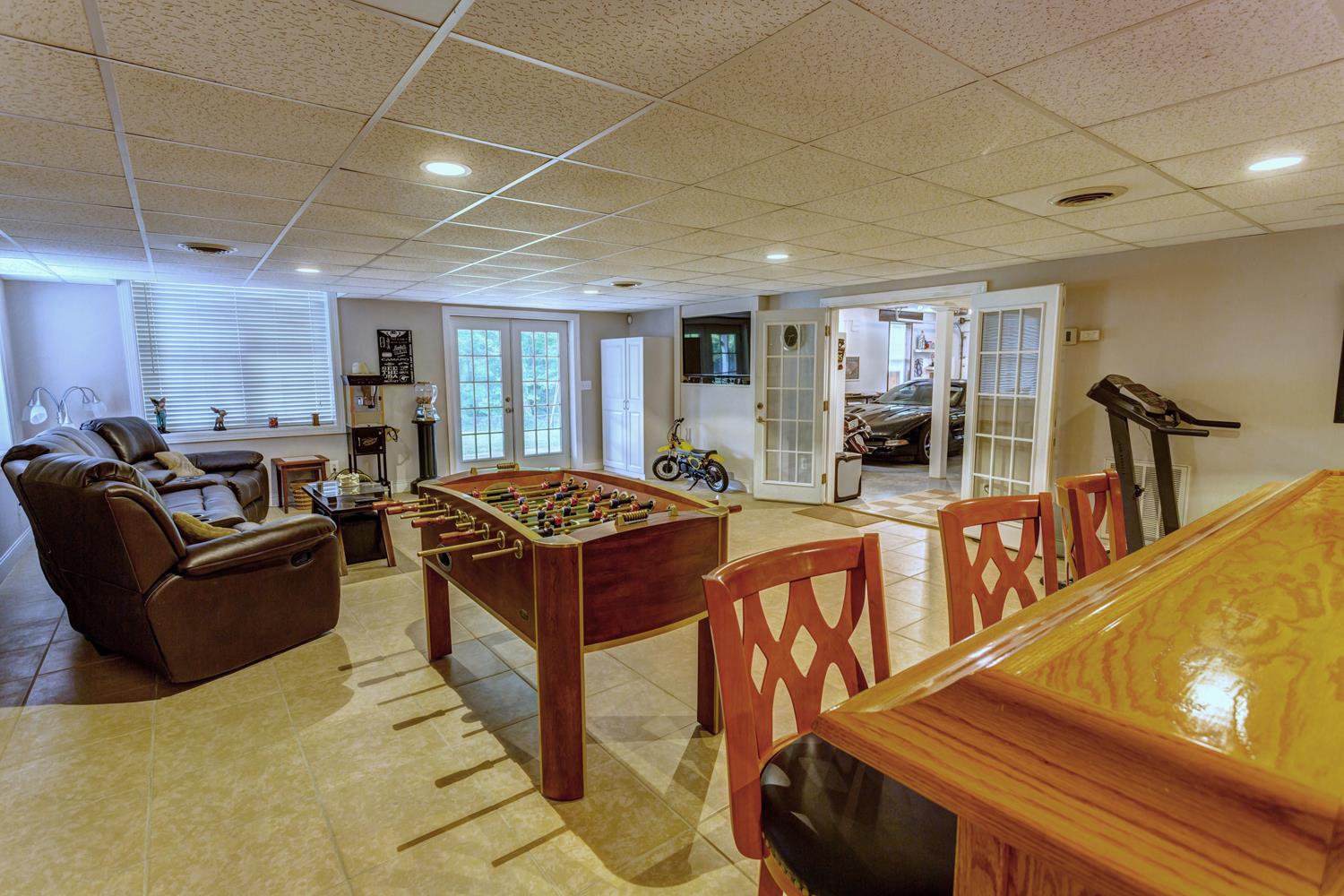 7571 Webster Road White House, TN 37188 - Photo 22 of 30 a living room with furniture and a flat screen tv
