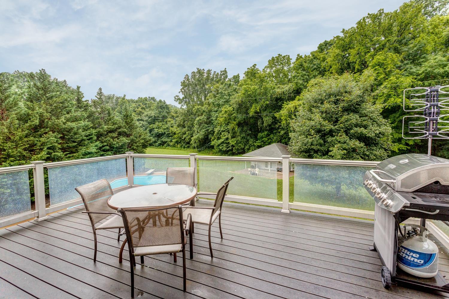 7571 Webster Road White House, TN 37188 - Photo 28 of 30 a balcony with wooden floor table and chairs