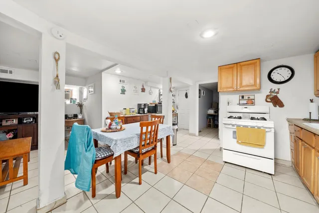 a view of kitchen with breakfast area