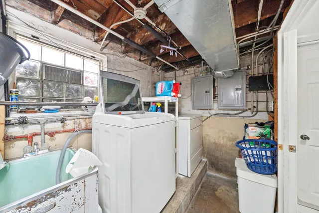 a utility room with dryer and washer
