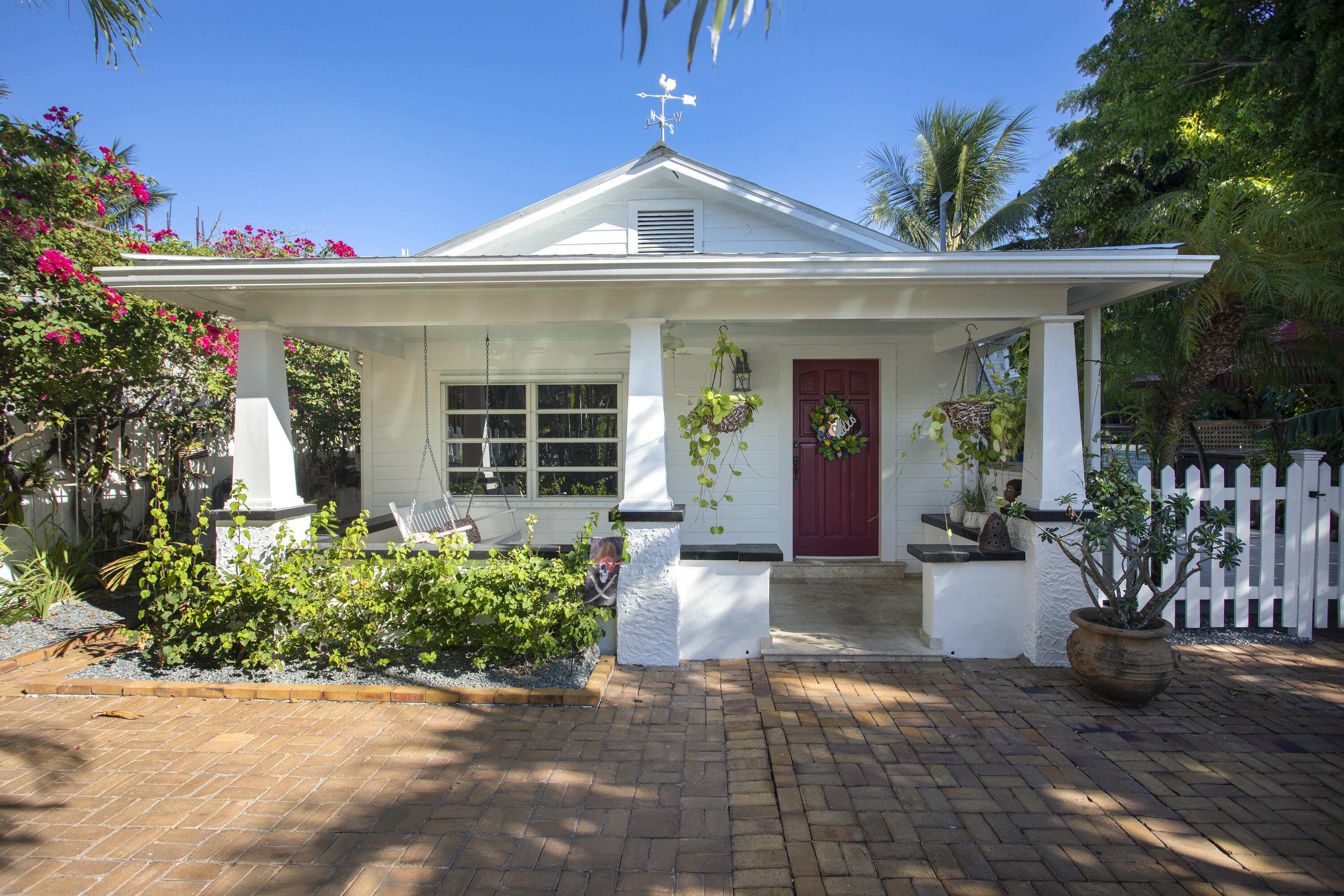 1506 South Street Key West, FL 33040 - Photo 1 of 27 a front view of a house with entryway