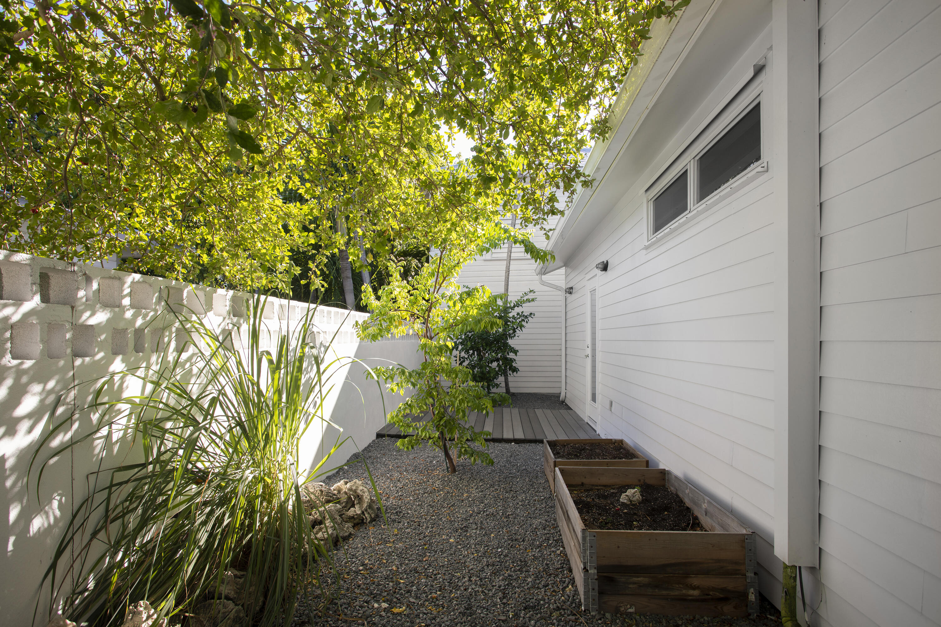 1506 South Street Key West, FL 33040 - Photo 26 of 27 a backyard of a house with lots of green space