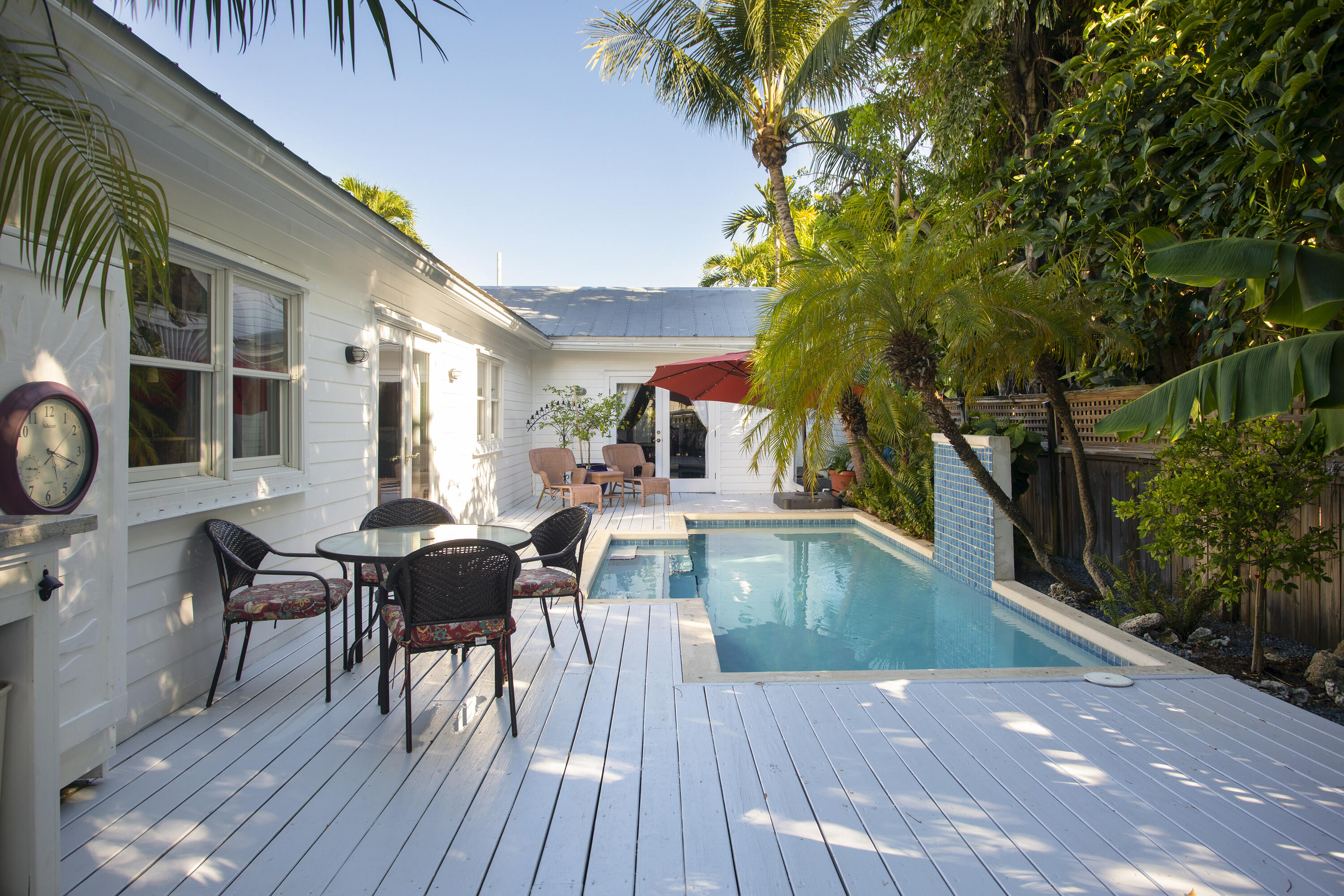 1506 South Street Key West, FL 33040 - Photo 3 of 27 a view of a house with swimming pool and sitting area