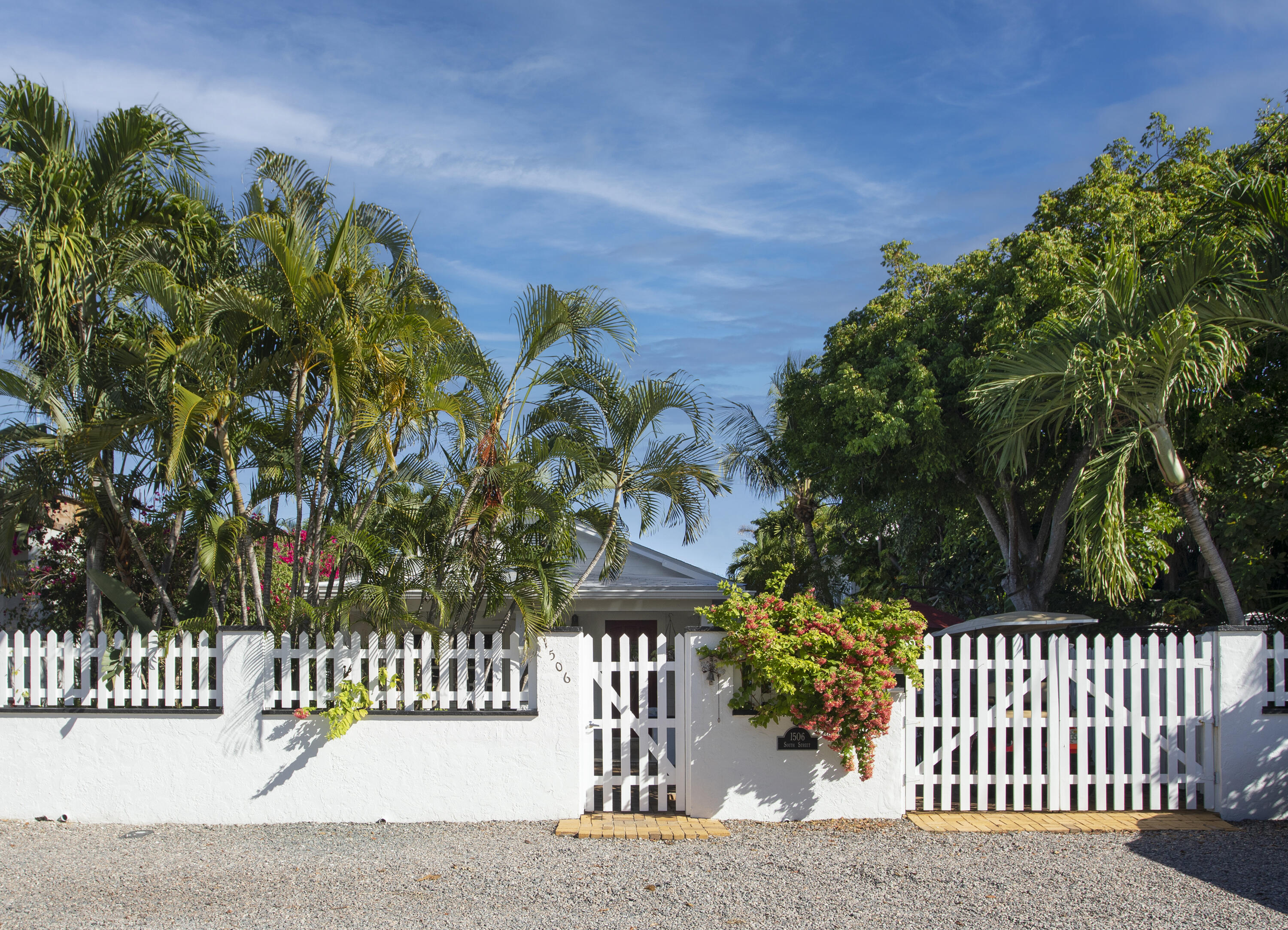 1506 South Street Key West, FL 33040 - Photo 7 of 27 a front view of a house with a garden