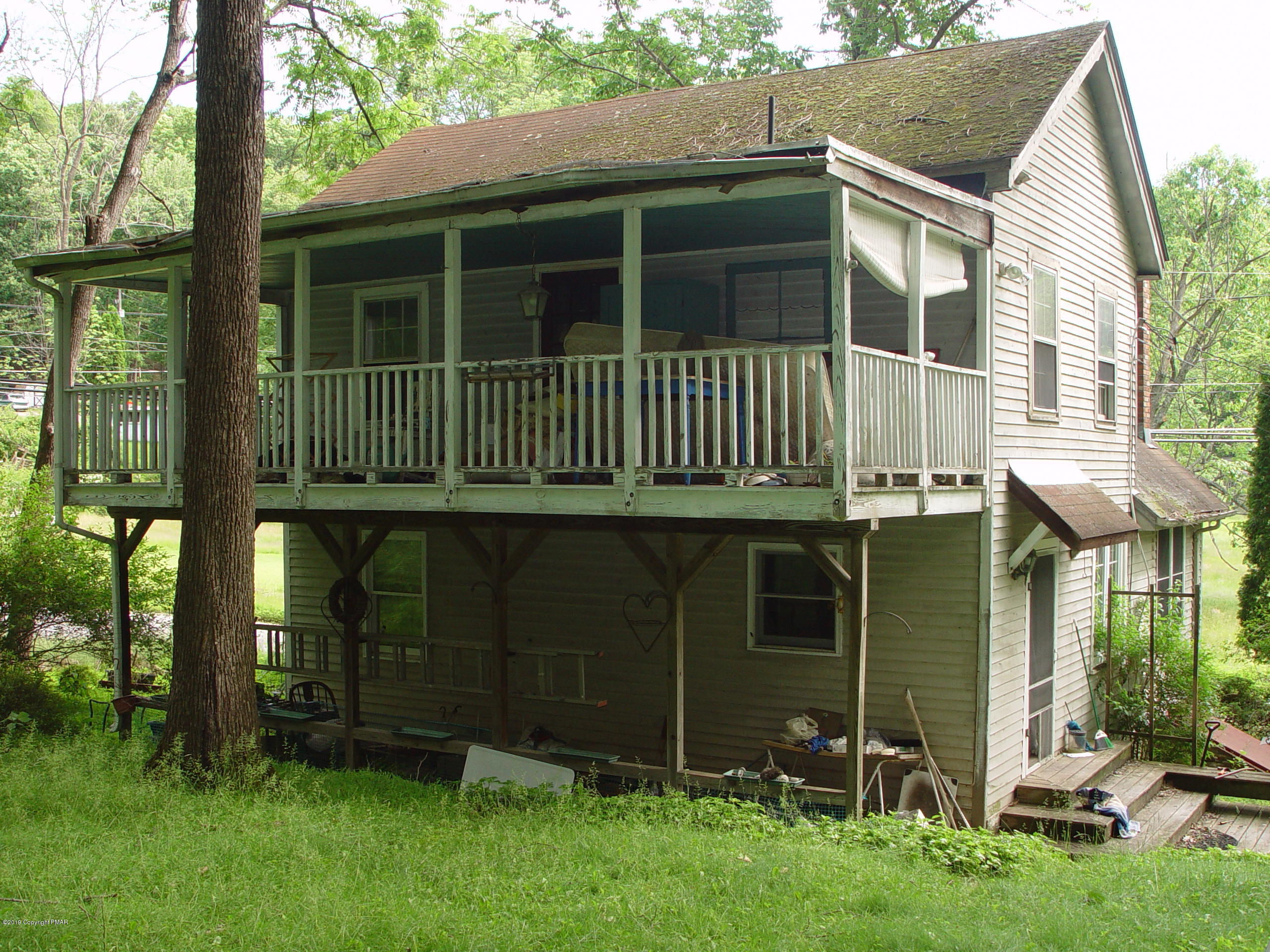 156 Dyson Road Swiftwater, PA 18370 - Photo 3 of 4 front view of a house with a yard