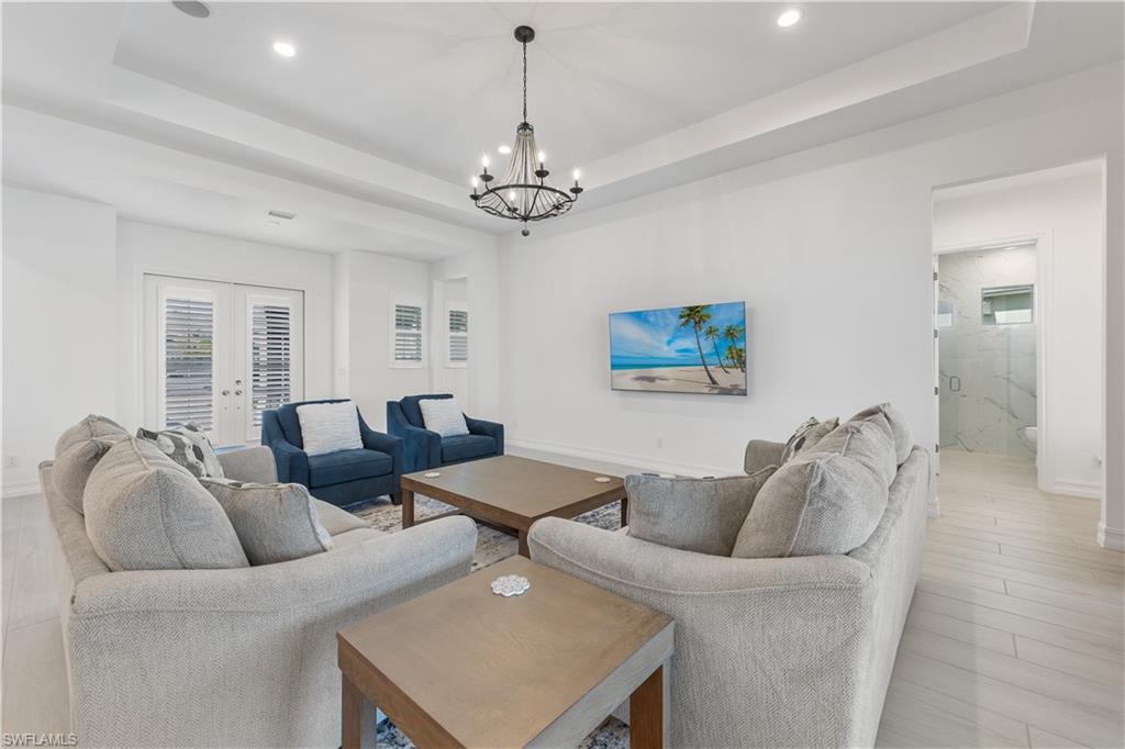 14265 Laguna Springs Lane Naples, FL 34114 - Photo 11 of 40 a living room with furniture