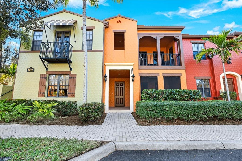 Mediterranean / spanish-style house with stucco siding and a balcony