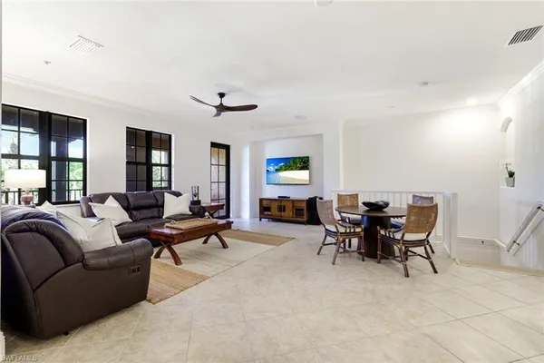 a kitchen with a stove a sink and a refrigerator