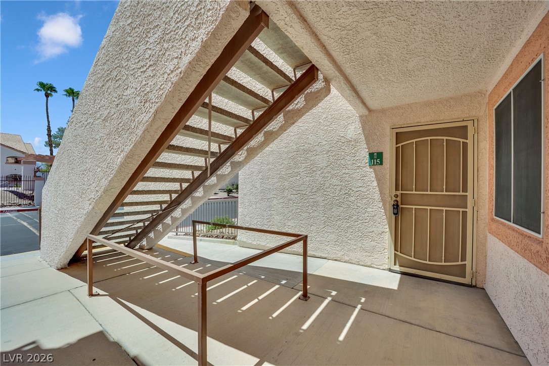7570 West Flamingo Road, Unit 115 Las Vegas, NV 89147 - Photo 28 of 34 Secure entry via a sturdy door with a metal security screen, offering convenience.