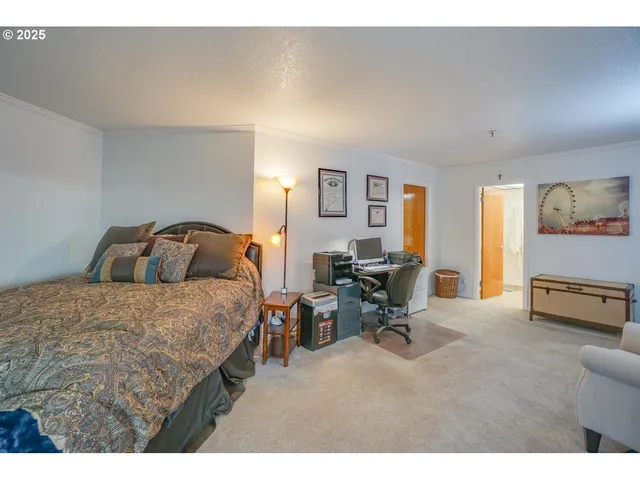 a bedroom with furniture and a bed